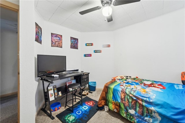 bedroom featuring ceiling fan and carpet flooring