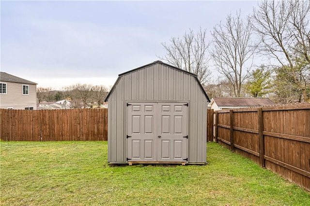 view of shed featuring a fenced backyard