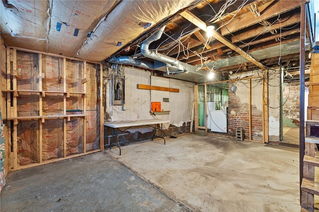 unfinished basement with electric panel