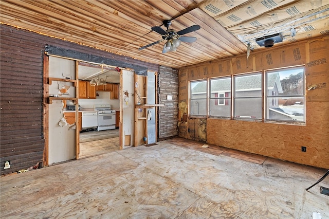 unfurnished living room featuring wood ceiling and ceiling fan