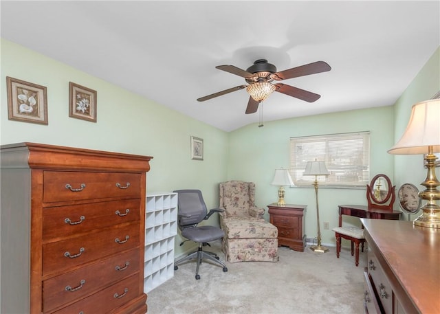 office space with light carpet, ceiling fan, and baseboards