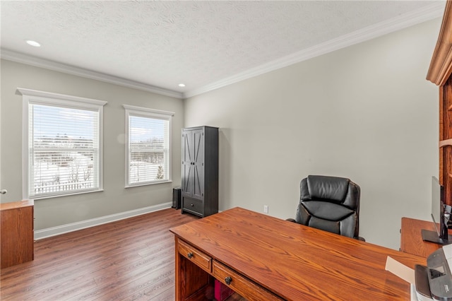 office space with baseboards, ornamental molding, wood finished floors, a textured ceiling, and recessed lighting