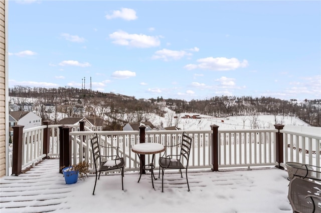 view of snow covered deck