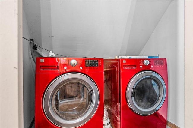 laundry room with laundry area and washer and clothes dryer