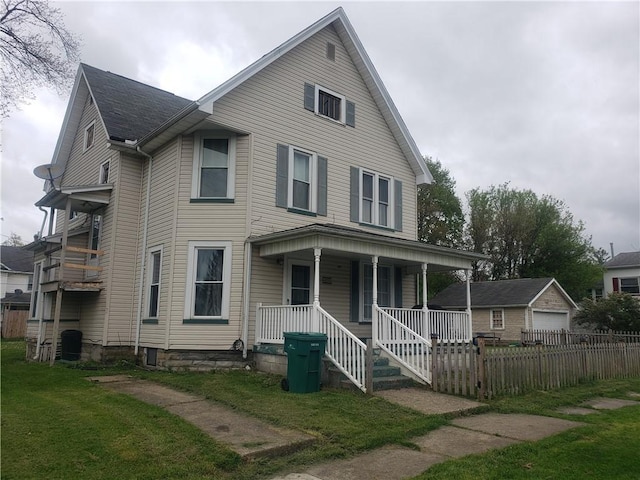 302 Jackson St, Jamestown, PA 16134 - view of front of property featuring a porch and a detached garage