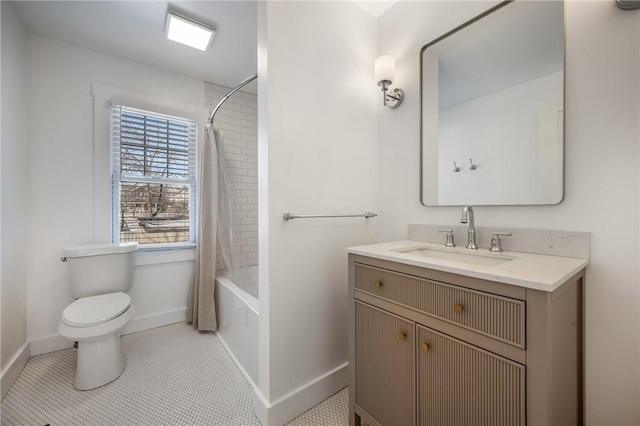 bathroom with shower / bathtub combination with curtain, toilet, vanity, tile patterned flooring, and baseboards