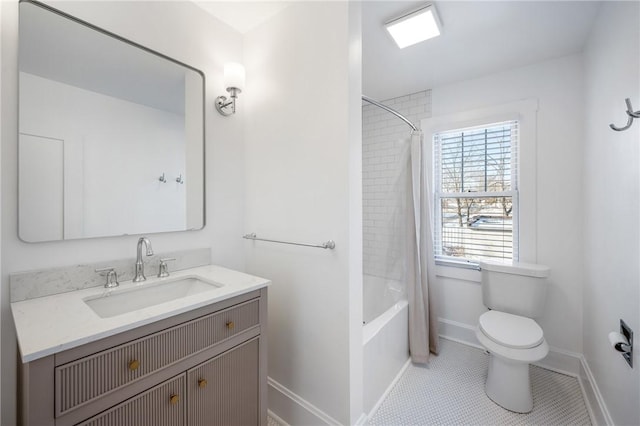 full bath with shower / bath combo, baseboards, toilet, tile patterned floors, and vanity