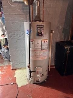 utility room with water heater