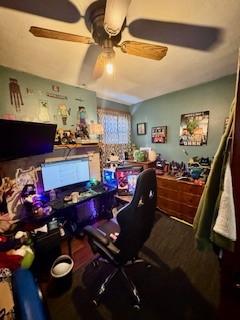 office space featuring a ceiling fan