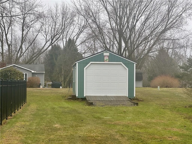 detached garage with fence