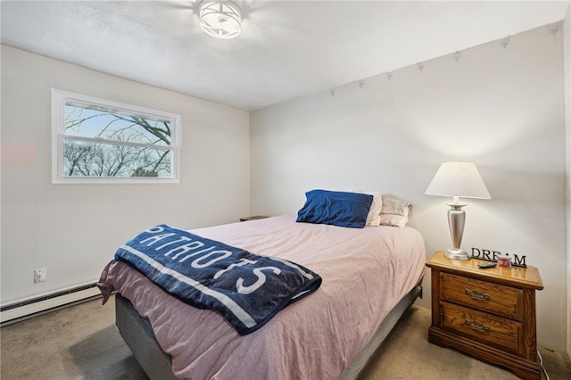 carpeted bedroom with baseboard heating