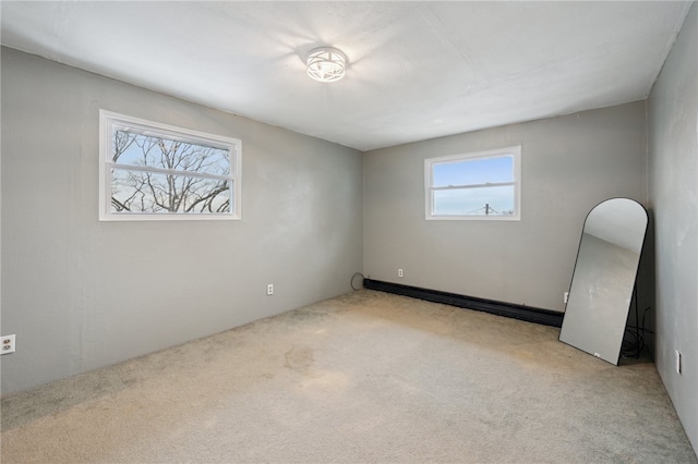 empty room with light colored carpet