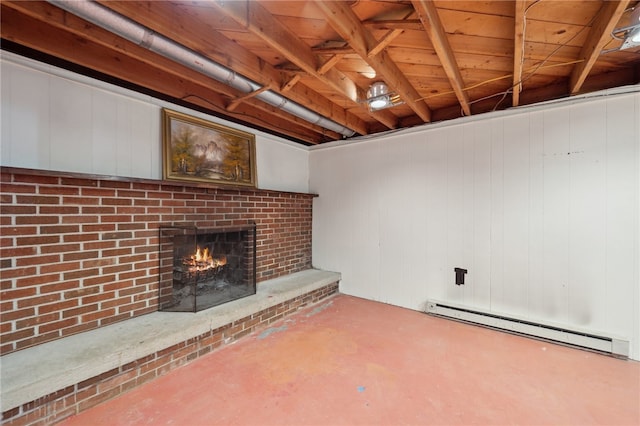 basement with a brick fireplace and a baseboard radiator