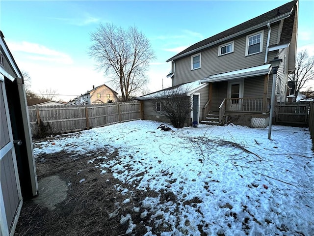 exterior space with a fenced backyard