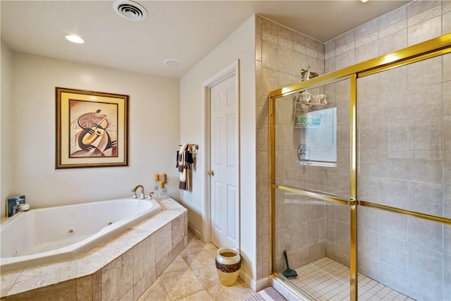 bathroom with a tub with jets, tile patterned flooring, a shower stall, and visible vents