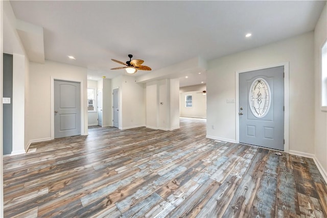 foyer entrance featuring ceiling fan, baseboards, wood finished floors, and recessed lighting