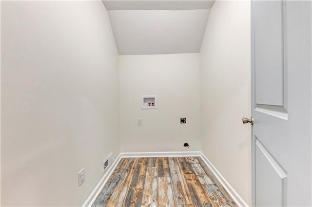 washroom with laundry area, washer hookup, wood finished floors, baseboards, and electric dryer hookup