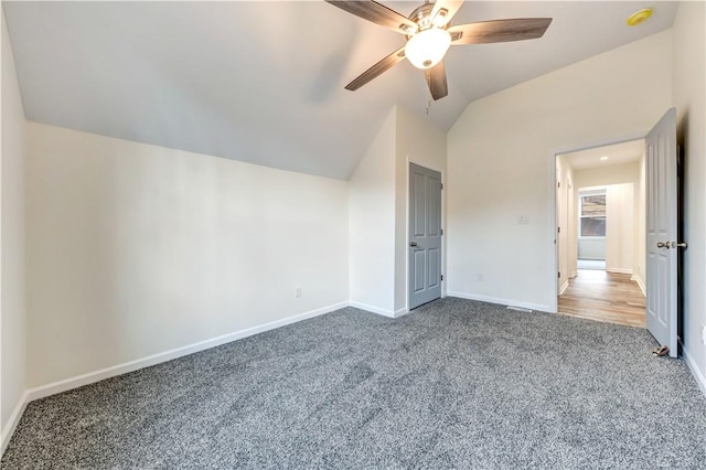 bonus room featuring carpet, baseboards, vaulted ceiling, and a ceiling fan