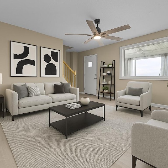 1155 6th Ave, Freedom, PA 15042 - living area with light wood-style flooring, baseboards, a ceiling fan, and stairway