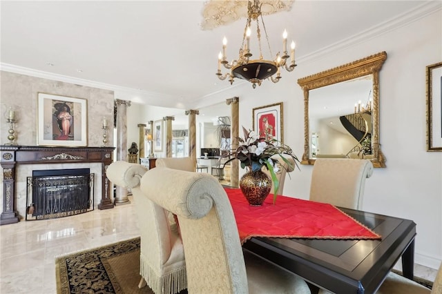 dining area with a chandelier, crown molding, and a high end fireplace