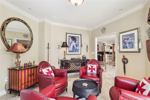 living area with ornamental molding and baseboards