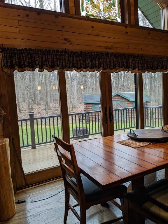 dining room with an inviting chandelier and light wood-style floors