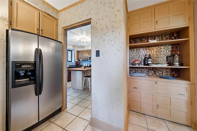 kitchen featuring light tile patterned floors, open shelves, appliances with stainless steel finishes, and wallpapered walls