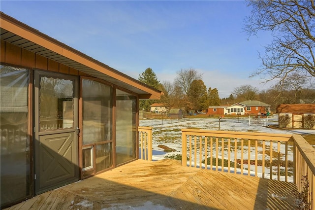 view of snow covered deck