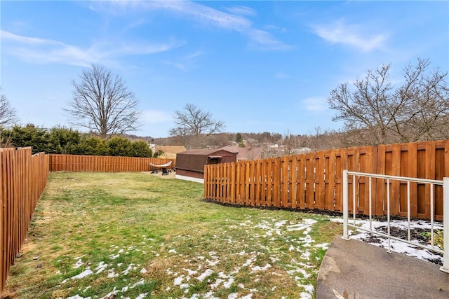 view of yard featuring a fenced backyard