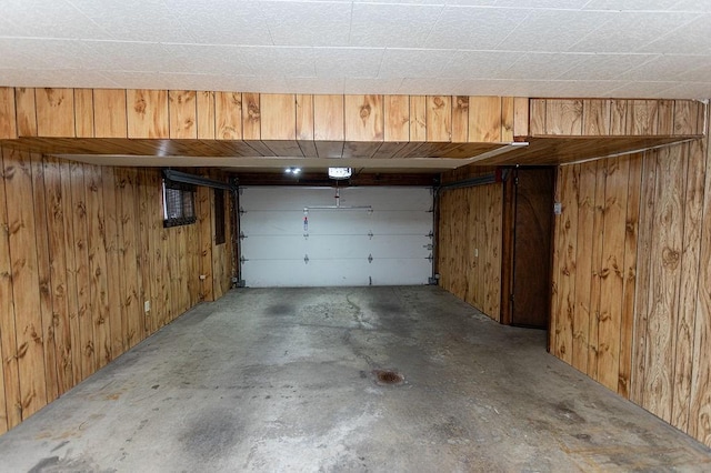 garage with wood walls