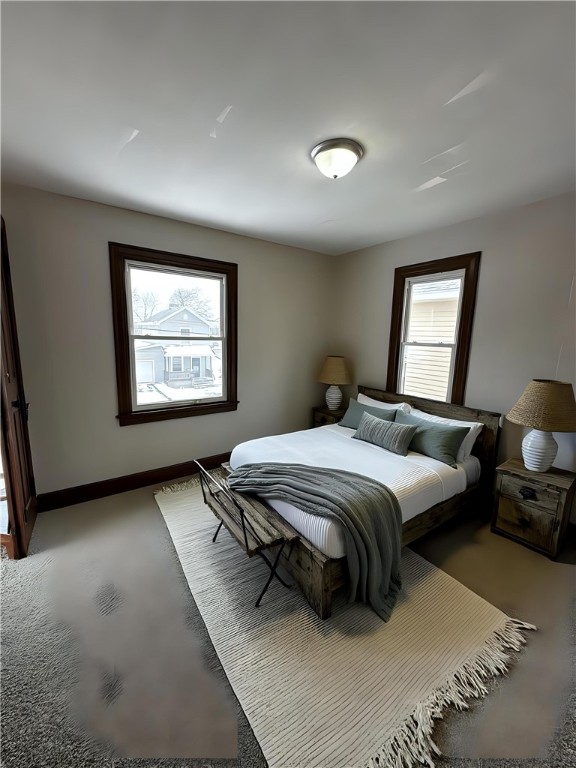 bedroom featuring baseboards