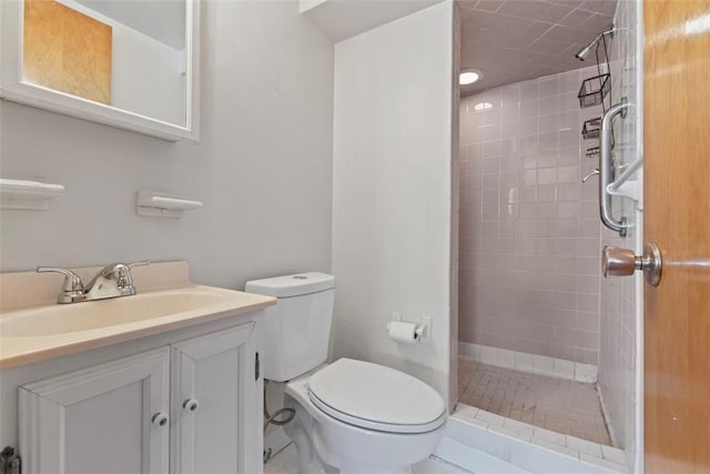 full bath with toilet, a stall shower, and vanity