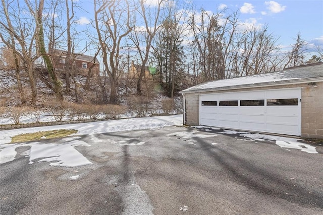 view of snow covered garage