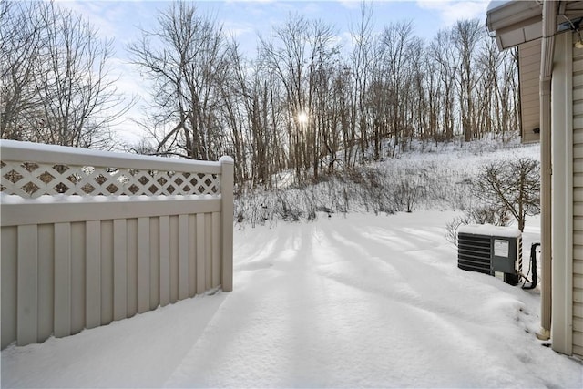 view of yard covered in snow