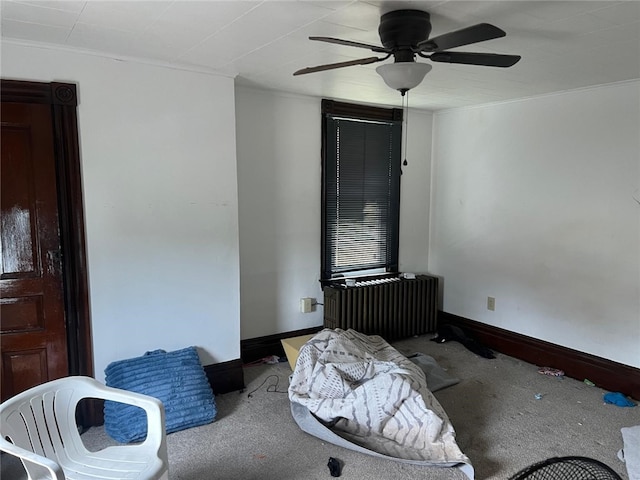 2504 Olympia St, Mckeesport, PA 15132 - spare room featuring radiator heating unit, a ceiling fan, carpet floors, and crown molding
