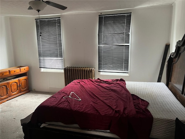 2504 Olympia St, Mckeesport, PA 15132 - carpeted bedroom with radiator heating unit and ceiling fan
