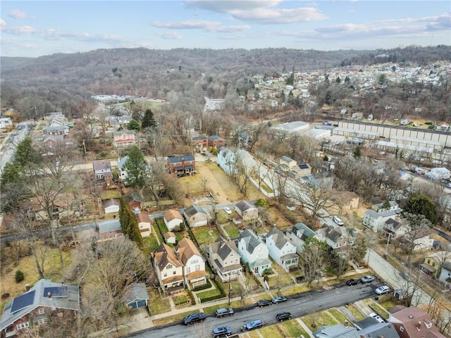 birds eye view of property with a residential view