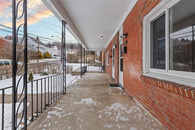 view of snow covered patio