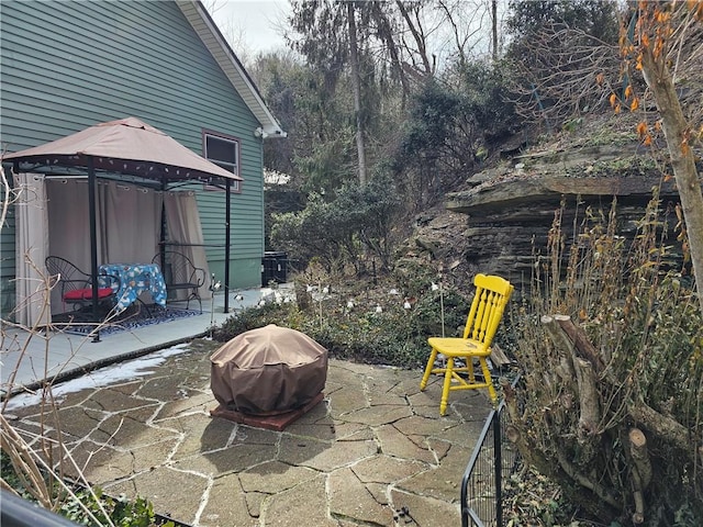 view of patio / terrace featuring area for grilling and a gazebo