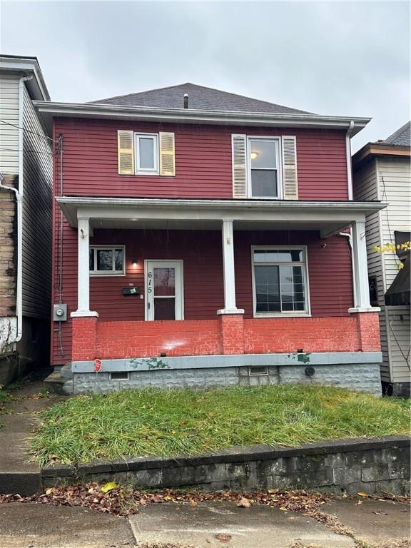 view of front of home featuring covered porch