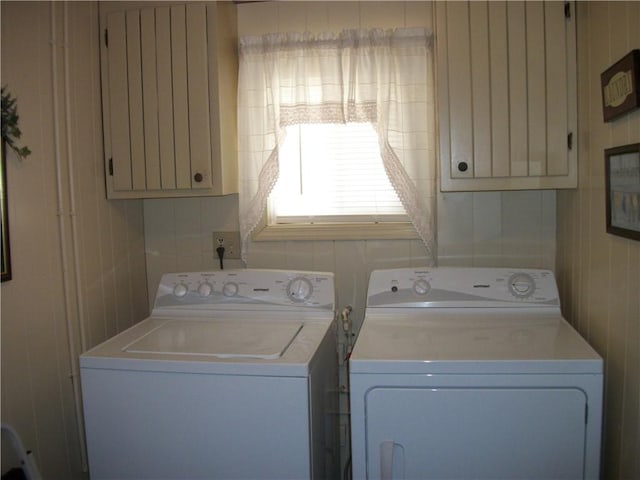 laundry area featuring washing machine and clothes dryer