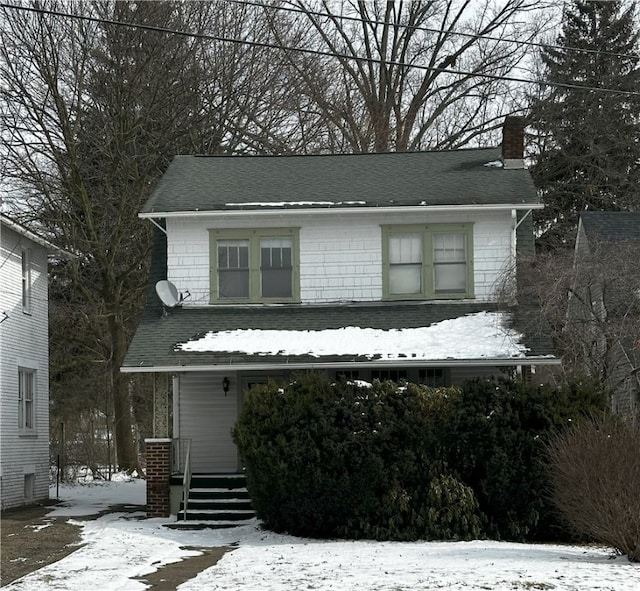 view of front of house with a chimney