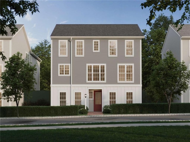 colonial home with board and batten siding