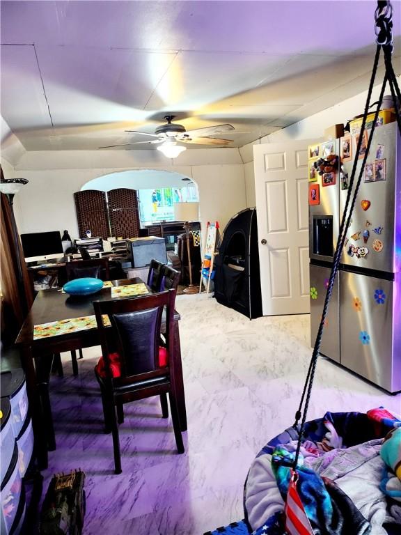 dining space featuring ceiling fan