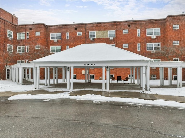 view of snow covered property