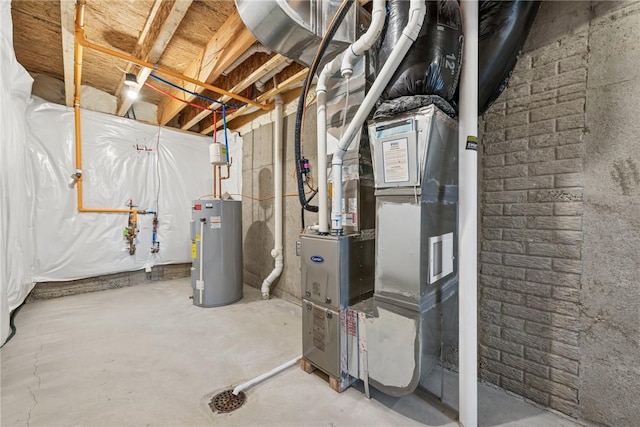 utility room featuring heating unit and water heater