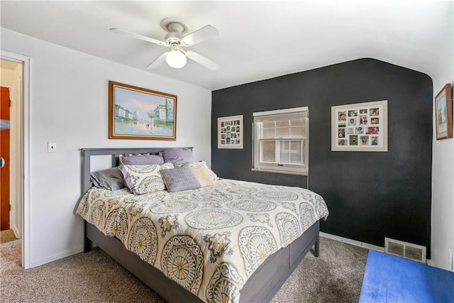 bedroom featuring carpet floors, visible vents, baseboards, and a ceiling fan