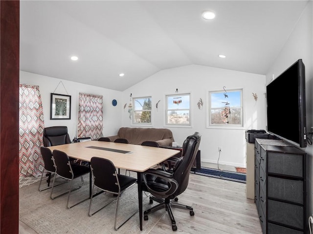 office featuring lofted ceiling, baseboards, light wood finished floors, and recessed lighting