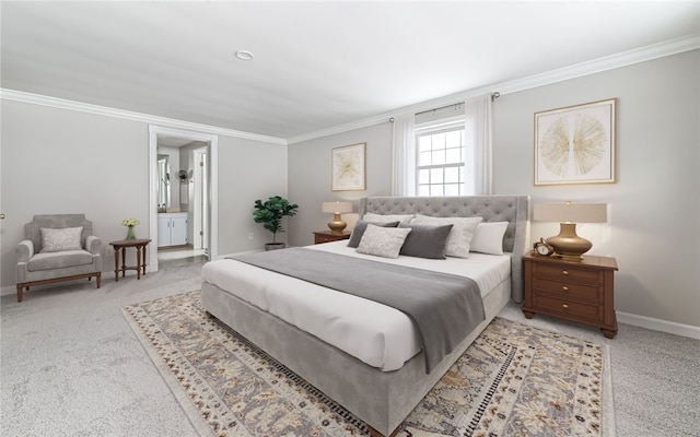 bedroom with light carpet, connected bathroom, baseboards, and crown molding