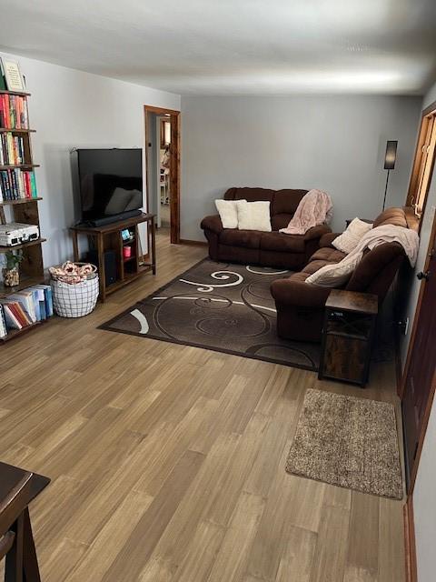 living area with light wood finished floors